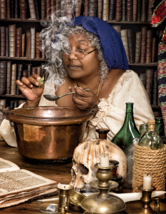 Image of a beautiful witch working with her altar